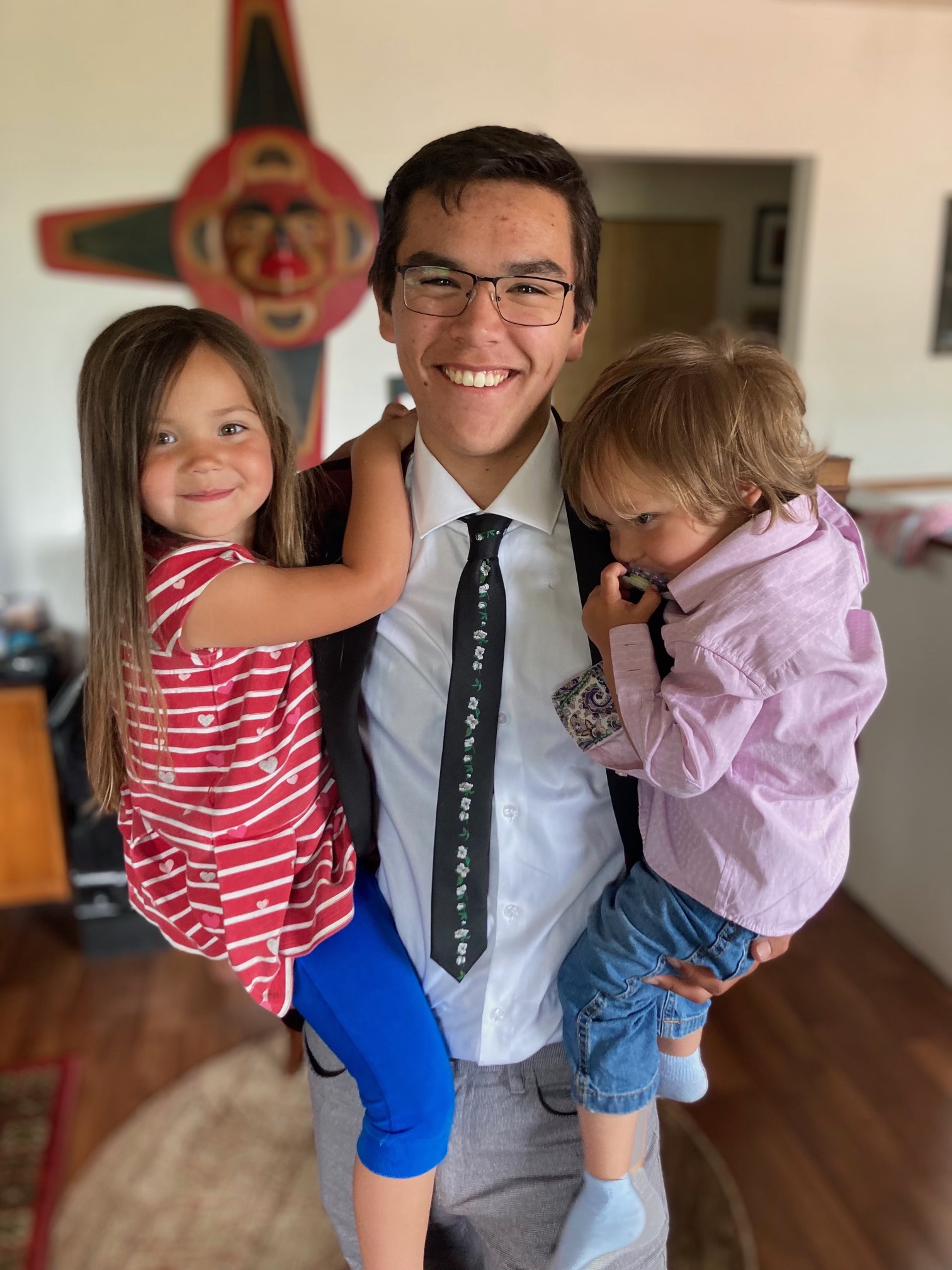 At just 17, Tim Masso has nearly finished an education degree in Indigenous language revitalization. He’s already teaching members of his community, though, including his niece and nephew, Huumiis and Cinkwa Wenstob. Photo submitted by Tim Masso.